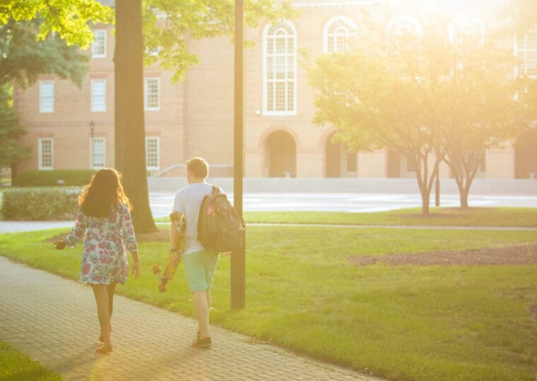 A tree-lined walk across the Regent University campus
